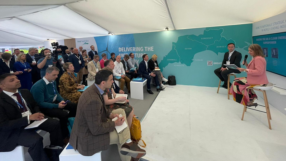 Tom Hayes MP speaking to attendees at the Great South West's UKREiiF 2025 conference.