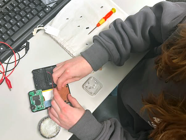 Team Repair at Sexey's School, Bruton, fixing a gadget.