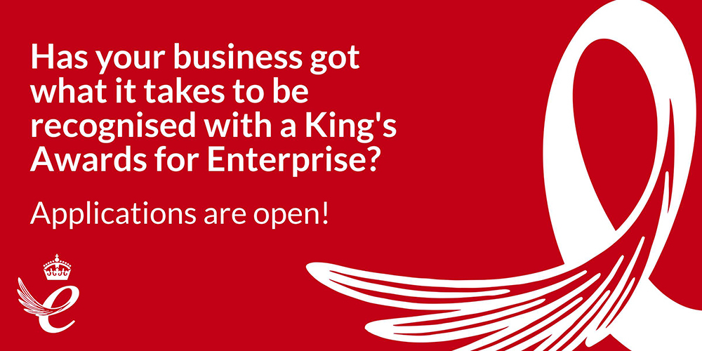 Red background with white text and wing design promoting the King's Awards for Enterprise; applications are open.