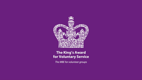 Kings Awards for Voluntary Service logo consisting of a white crown on a purple background.