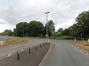 Wide view of A39 Dunster Steep junction showing traffic lights and road layout, with signals set for replacement in early 2026.