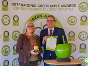 Fixy Project Co-ordinator, Linda Hull, accepting Green Apple Award for environmental best practice with trophy and certificate.