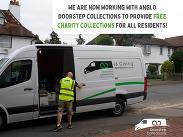 Person in high-vis vest loading a white Anglo Doorstep Collections van promoting free charity collections for residents.