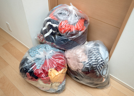 Disposal of clothing. Image credit y Studio via Getty