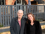 Cheese and Grain Director Steve Macarthur and Frome town councillor Sara Butler standing outside the Cheese and Grain building.