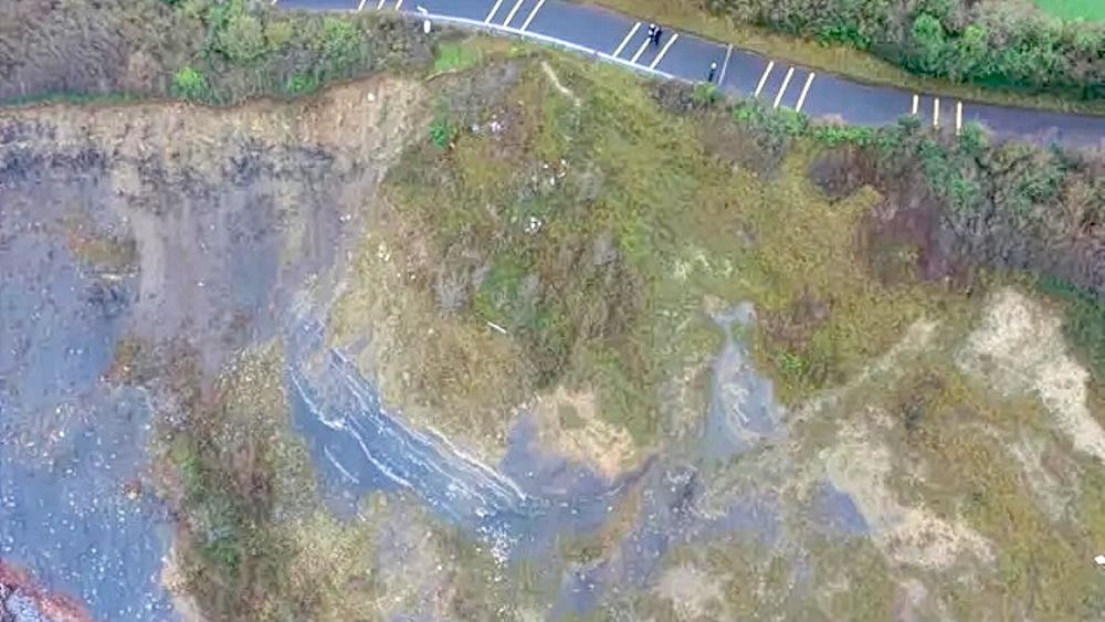 Aerial view of the coastal erosion on the B3191 Cleeve Hill near Watchet.