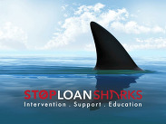 Shark fin breaking the surface of calm blue sea under a cloudy sky, with text “Stop Loan Sharks – Intervention, Support, Education”.