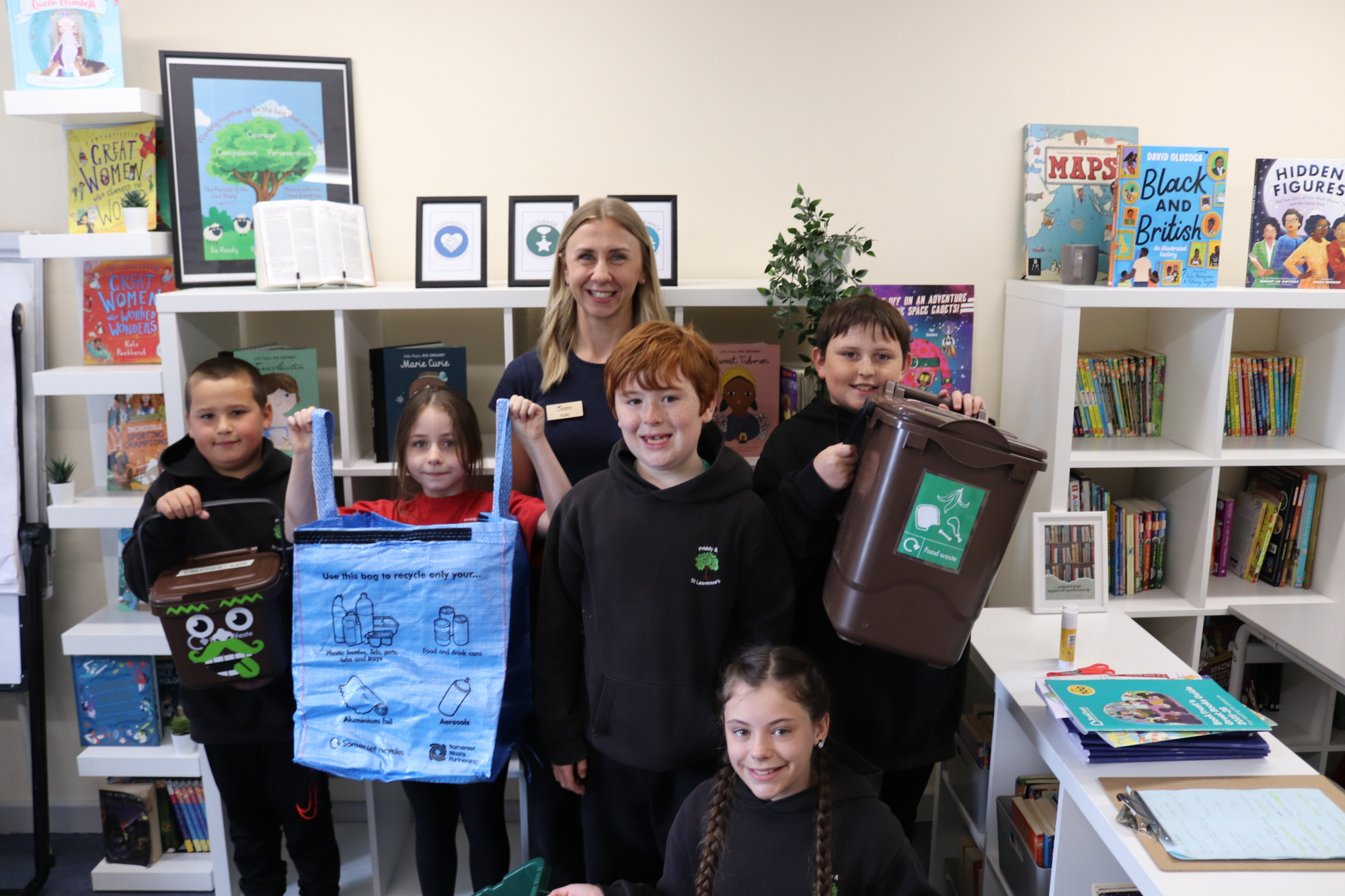 Children from Priddy and St Lawrence school with Schools against waste team