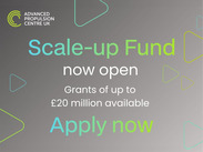 Advanced Propulsion Centre UK Scale-up Fund graphic promoting grants of up to £20 million for business growth and innovation.