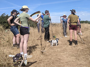 Council staff learn to use Austrian scythes during a training session at Ham Hill.