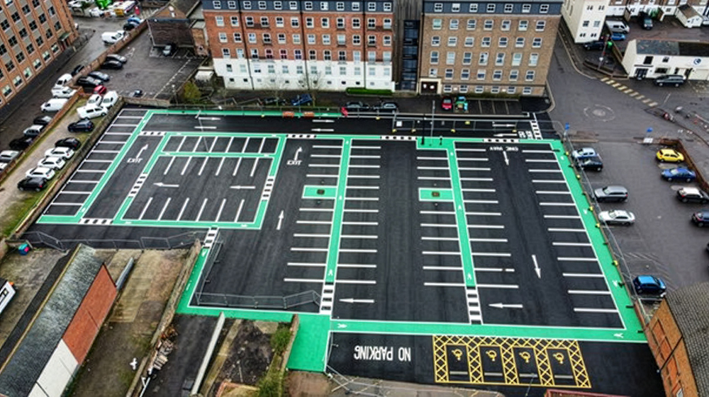 An aerial view of the upgraded Crescent Car Park, showing clearly marked bays, EV charging spaces and new surfacing.