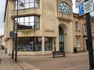 Main entrance area at Yeovil Library, showing the library building, entrance doors, windows and surrounding pavement.