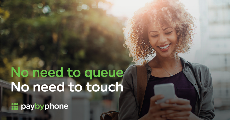 Photo of a young woman holding a phone and smiling with the text 'no need to queue, no need to touch, pay by phone'.