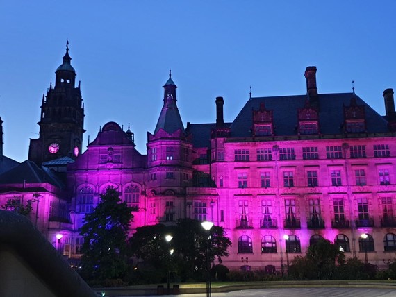 Sheffield Town Hall lit up with purple lights