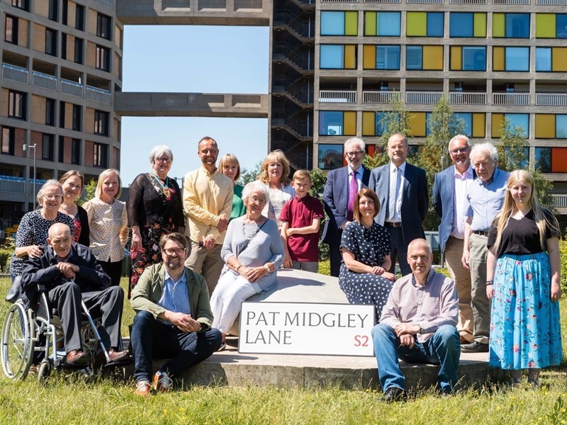 Friends and family stood around the new road sign at Park Hill