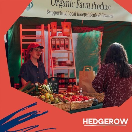 lady selling vegetables at a stall
