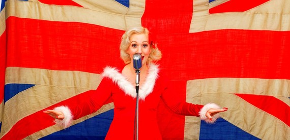 woman singing songs in 40's xmas fashion