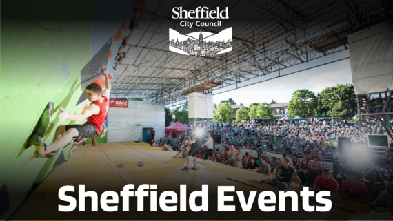 Close up shot of a man at an angle scaling a climbing wall on a stage on front of a large crowd.SCC logo on top Sheffield Events
