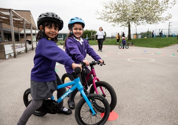 2 girls on bikes