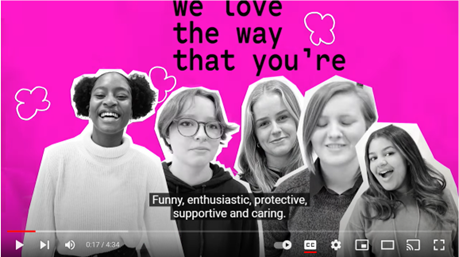 Video image with 4 teenage girls on a pink background.