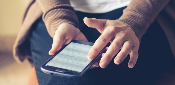 someone using a mobile phone