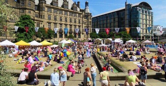 Crowds gathered under a blue sky at the Peace Gardens for Pinknic 2022