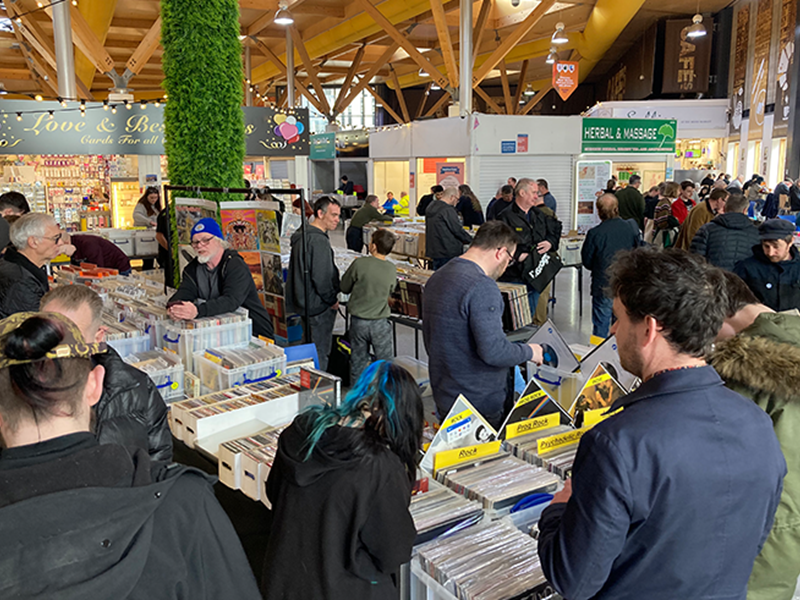 Record collectors searching through the different genres records a the AA record fair in the Moor.