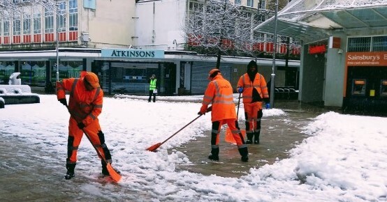Street cleansing team clearing snow from the Moor in Sheffield city centre in March this year.