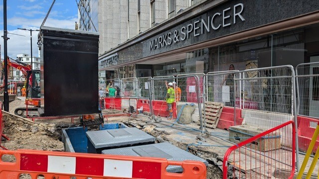 Underground bin unit being installed on Fargate