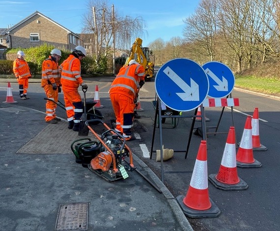 Our team completing a permanent repair to a pothole