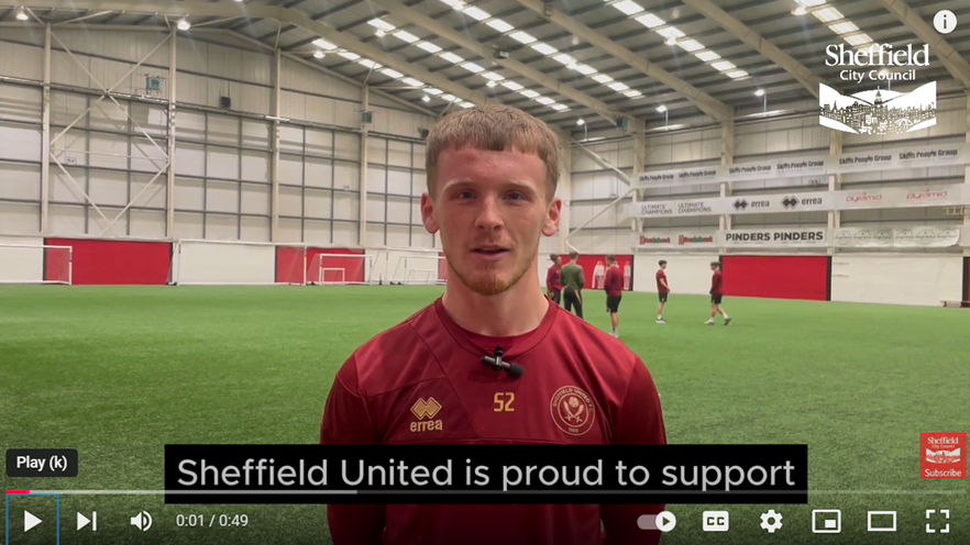 Screenshot of YouTube video with Sheffield United player at training ground