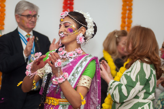 woman with jewelry singing