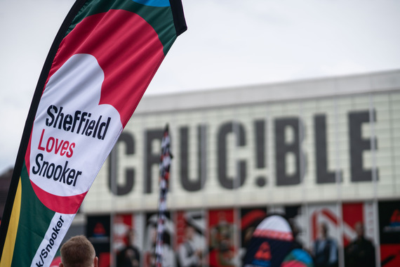 Sheffield Loves Snooker banner in front of the famed Crucible
