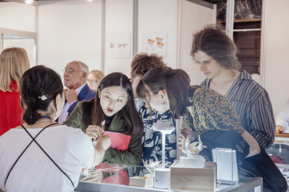 Customers appreciating jewellery at a previous event