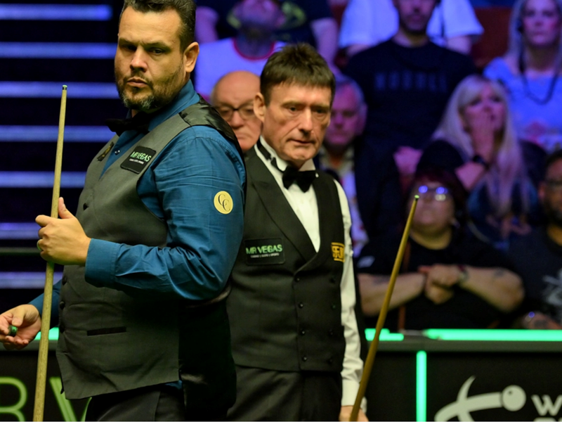 Jimmy White and Igor Figueiredo during a snooker match