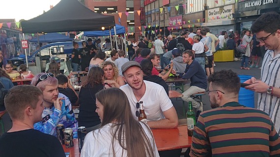 Festivalgoers having fun at Castlegate.