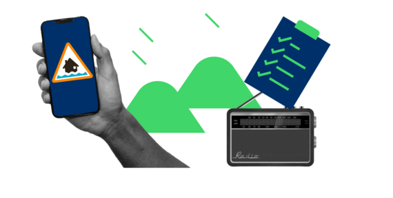 A hand holding a mobile phone showing a flood warning sign, with a checklist and radio next to it