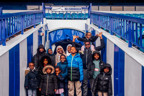 A group of children in the Sheffield Wednesday football club tunnel.