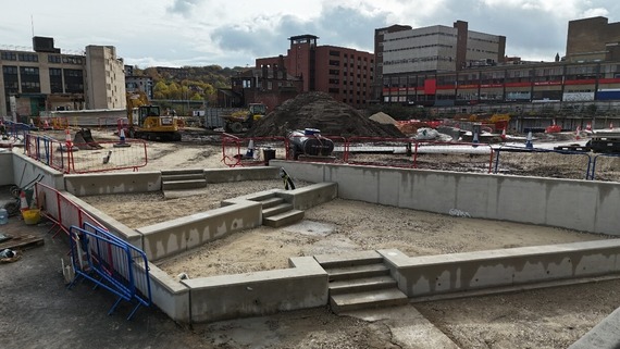 Installation of low concrete retaining walls at Castlegate