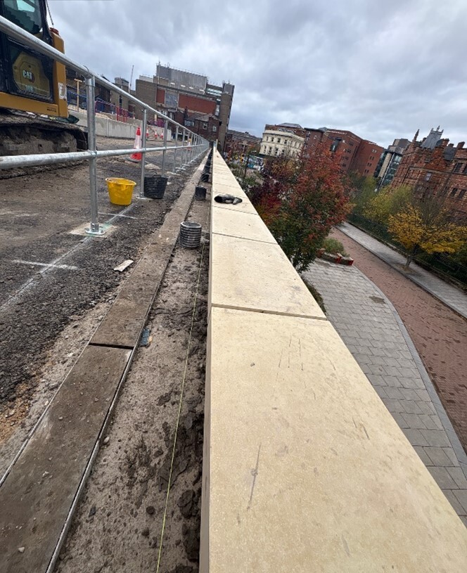 Wet cast copings on existing Castlegate wall