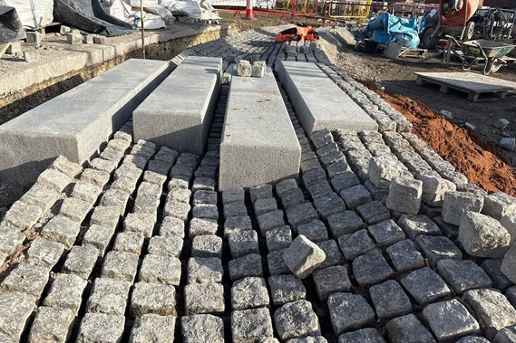 Cobblestones and granite blocks on site at the Castlegate park