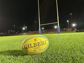 A rugby ball on the new synthetic pitch