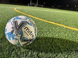A football on the new synthetic pitch