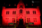 Lerwick Town Hall lit red