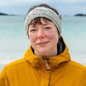 Jen Hadfield looks directly into the camera thoughfully.