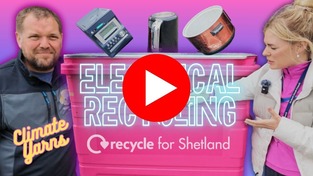A clickable Youtube Banner featuring two Council staff standing next to a bright pink bin