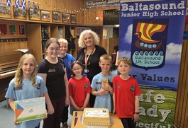 Children from Baltasound School with their play ambassador award