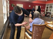 Resident having their vaccination at a care home