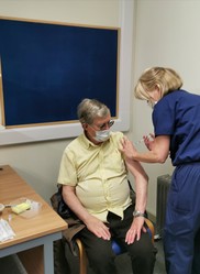 One of the first people receiving their vaccination at Church Stretton on 28 January 2021