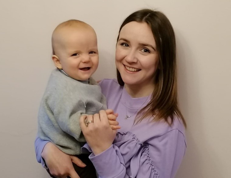 Health worker Oliva Evans with son Raymond